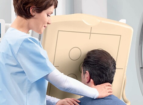 Head xray nurse helping patient